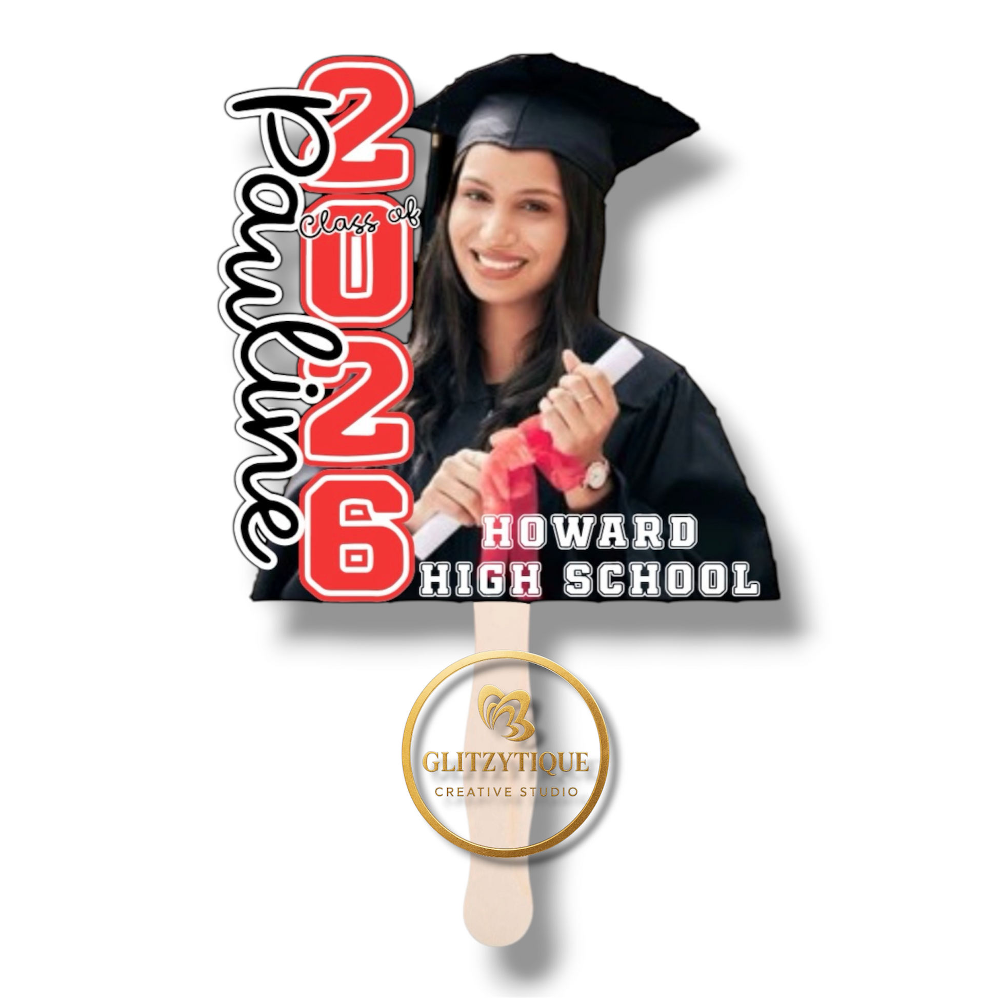 Graduation-themed paddle with '2026 and a graduate holding a diploma.